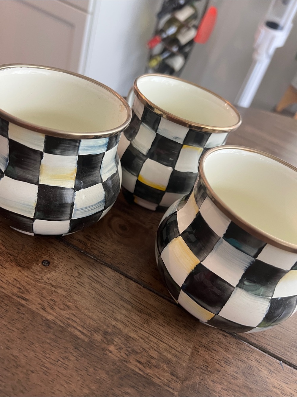 MacKenzie-Childs Black and White Check enamel mugs with Gold Trim